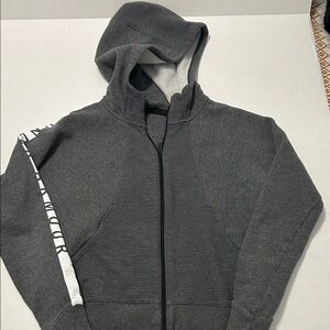 Under Armor ladies medium.  Gray Zip-Up Hoodie with White Accents